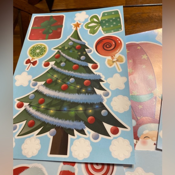Christmas window clings.  12 in package. All different designs.  New. - Picture 3 of 7